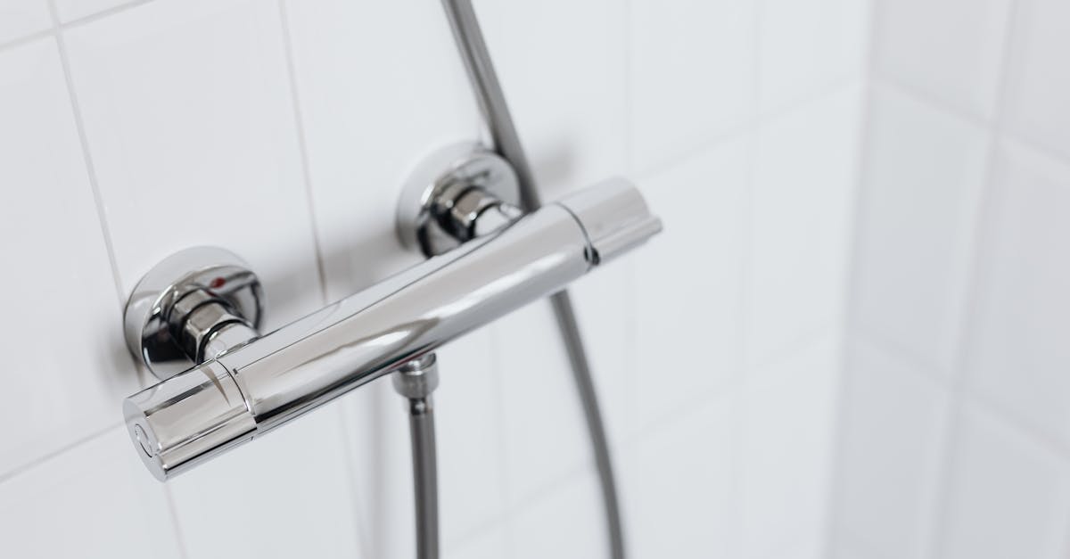 Licensed plumber clearing a clogged toilet fast
